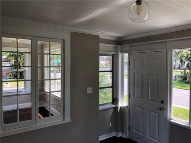 Front porch looking in to den.