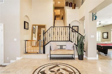 Stairs featuring ceiling fan, visible vents, pool