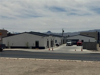 View of asphalt street featuring a mountain view
