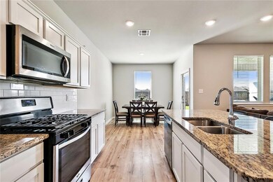 Dining room is located right off of kitchen