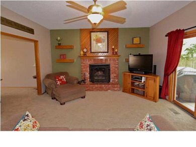 Family Room With Wood Burning Fire Place