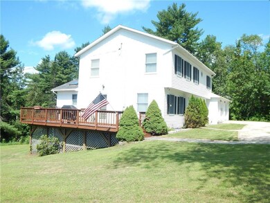 Side of house with large deck off of...