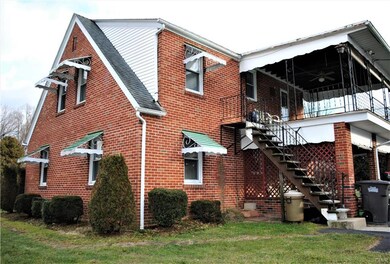 Solid brick home with emergency exit from second f