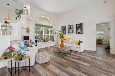 Living Room w/Pool Views from Large Window