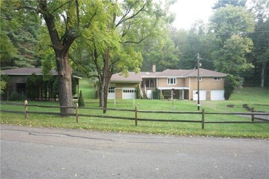 2 separate 2 car garages and a over-sized RV port 