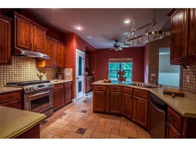Kitchen. Gourmet kitchen with propane cook top, sst applainces, pot rack, pantry, etc.