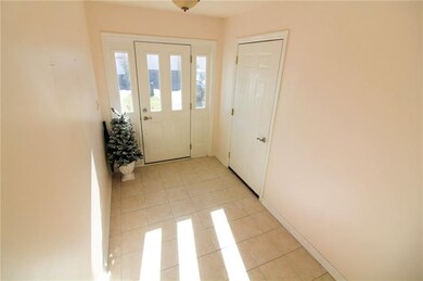light and bright tiled entryway