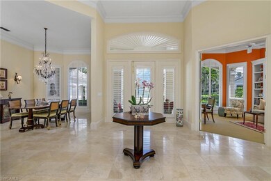 Spacious foyer with crown molding