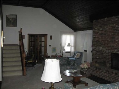 Living Room. View of Living Room, Stairway and Fre