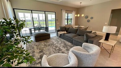 Living room featuring light tile patterned floors