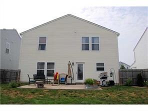 Exterior Back. Back of house with upgraded 12x20 patio great for relaxing on your lawn furniture and cooking out.