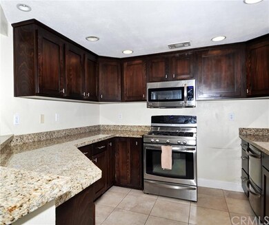 Beautiful granite counters, re-faced cabinets.