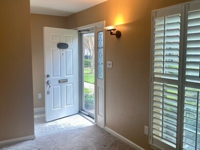 Entry with classic terrazzo tile.