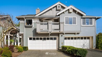 Large garage on the left belongs exclusively to #104- front door is through the beautiful arbor or direct access can be gained from inside garage.