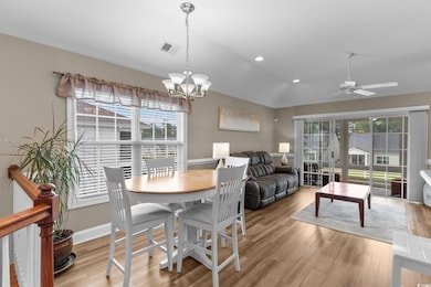Dining space with a healthy amount of sunlight, va