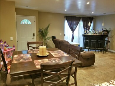 Front door, Family Room and Dining Room