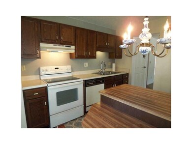 Kitchen. Newer smooth-top stove with self-cleaning