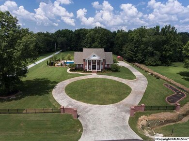 This drone view shot of the home shows the features of the front view of the home !! This home is a definite must see.