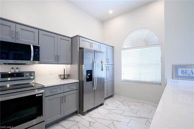 Kitchen with appliances with stainless steel finis