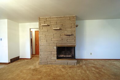 Vintage limestone fireplace
