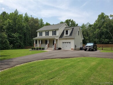 Photos show the same floor plan built by McLaughlin Homes.