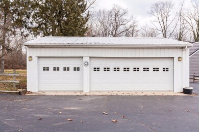 3 Car Detached Garage w/ Service Door.