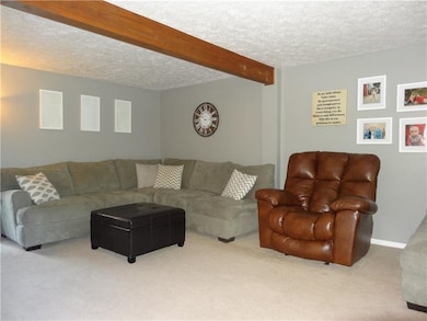 Big family room with gas fireplace.