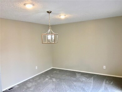 Gorgeous dining room with counter to the kitchen a