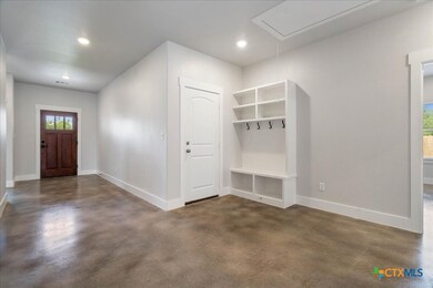 A look at the built-in storage unit off the hallwa