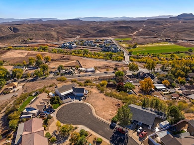 Aerial perspective of suburban area with a mountain backdrop