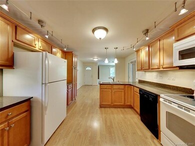 Newer kitchen, appliances, and lighting. Corian co