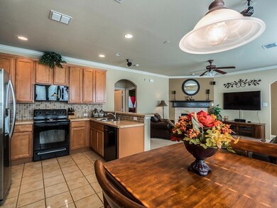 Lots of cabinets in this kitchen!  Breakfast bar t