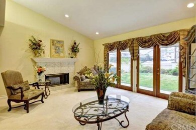 Living Room with French Doors that Open to Front Y