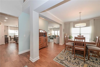 Dining space featuring baseboards, ornamental mold