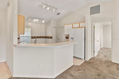 Kitchen and Entrance to Master Bedroom