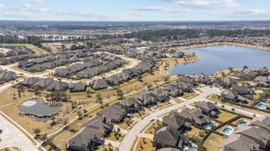 The home is situated between a smaller pond and a larger one, with walking trails and a community park nearby - there's lots to do to enjoy the outdoors in this comminity.