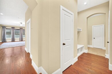 From the entrance hallway to the left is the living room, to the right is the 3 bedrooms.