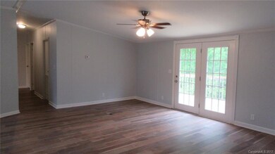 Home has split bedroom floorplan. Double doors open to oversized deck.