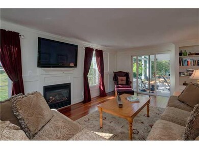 Living Room. Raised panel woodwork, crown moulding