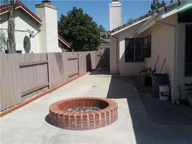 Sideyard w BBQ Pit