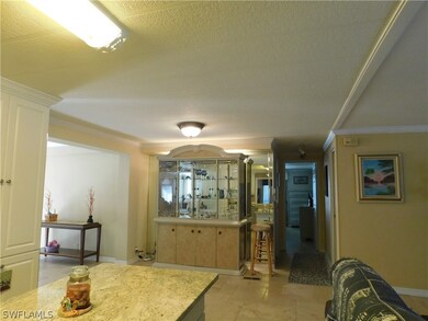 Looking from the kitchen island to the other side