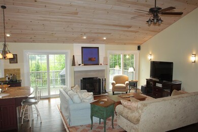 Spacious open floor plan Living room with fire pla