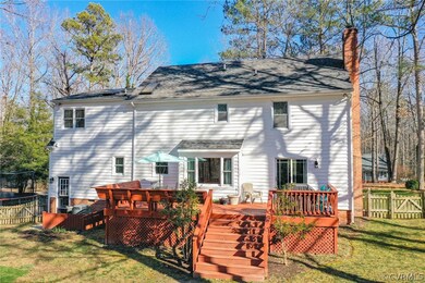 Rear of house showing large rear deck,  showing ba