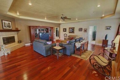 Great room pic featuring mahogany wood flooring, c