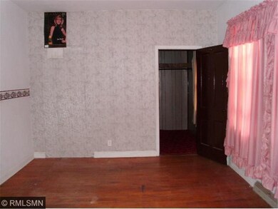 Main floor bedroom with HW floors with large walk 