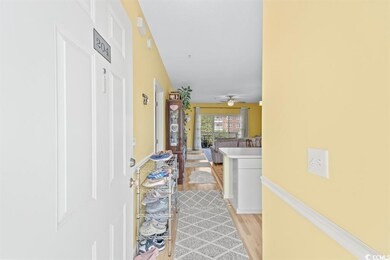 Hallway featuring light hardwood / wood-style floo