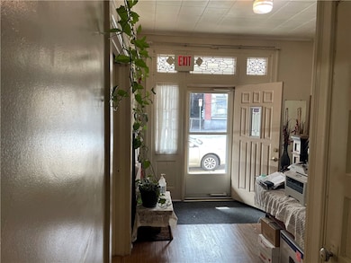 Foyer toward Front Door Entrance