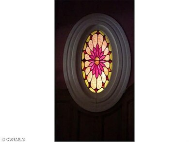 Exterior Front - Stained glass filters light in fr