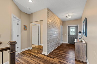 Welcome friends and family in the spacious entrance.