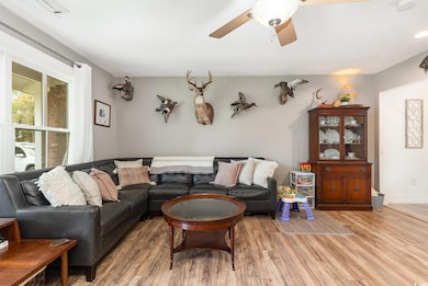 Living area featuring light wood-type flooring and